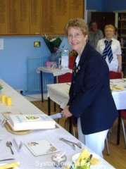 president-ruth-cuts-cake
