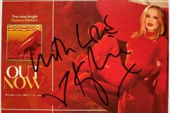 A picture of the Signed postcard that is included with the auction of SKBs topper